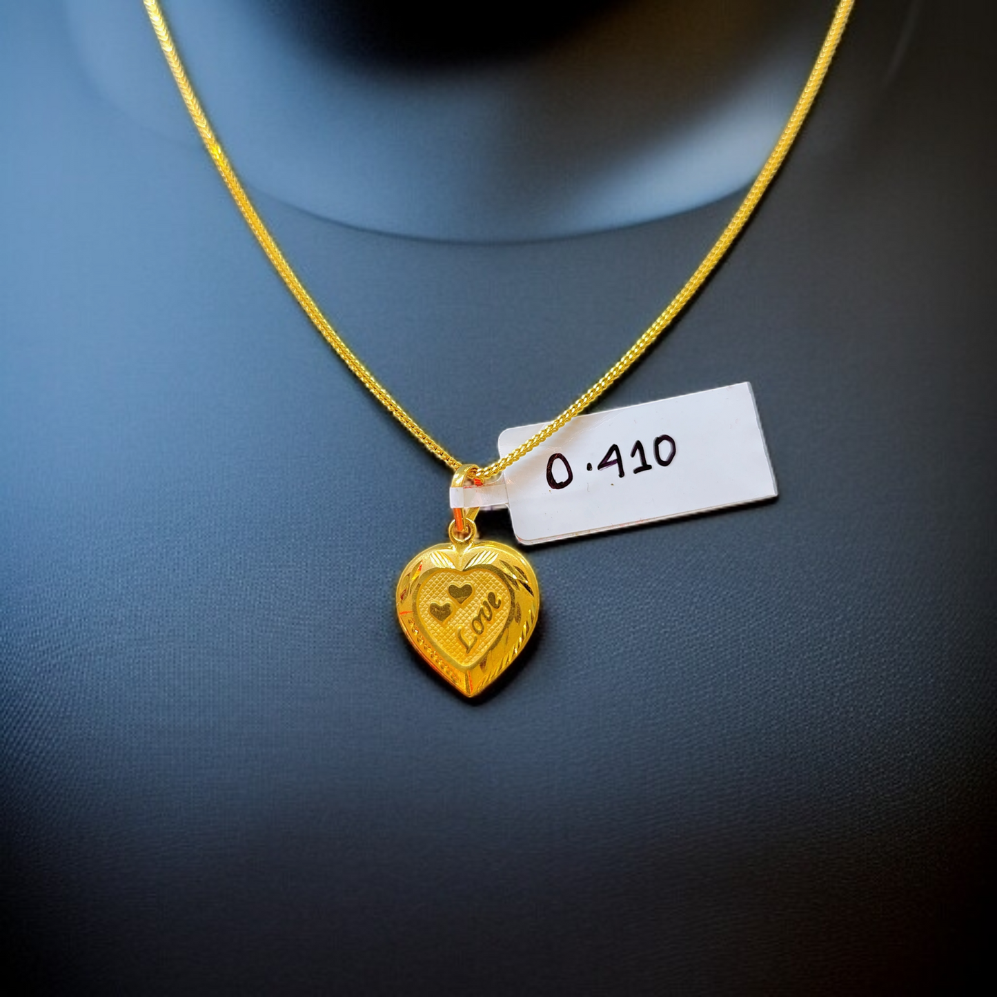 TRJ WGT: 0.410 GM APPROX KDM GOLD LOCKET 1 PIECE (50 TONCH) WITH ADJUSTABLE TASSEL.