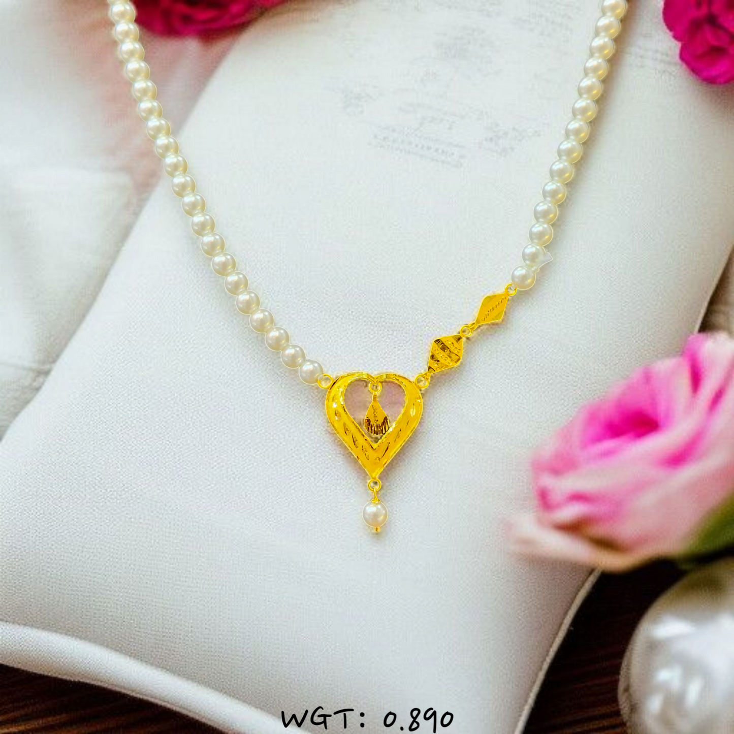 TRJ WGT: 0.890 GM APPROX HUID HALLMARK 22KT GOLD MOTI PENDANT 1 PIECE.