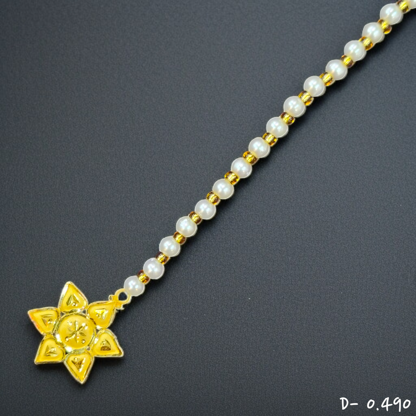 TRJ WGT: 0.490 GM APPROX 22KT HUID HALLMARK GOLD TICKLY (MANGTIKA) 1 PIECE FOR MARRIAGE.