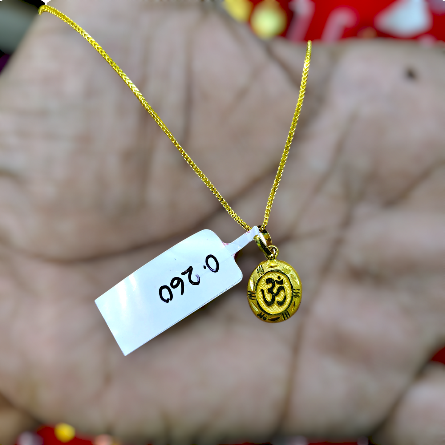 TRJ WGT: 0.260 GM APPROX KDM GOLD LOCKET 1 PIECE (50 TONCH) WITH ADJUSTABLE TASSEL.