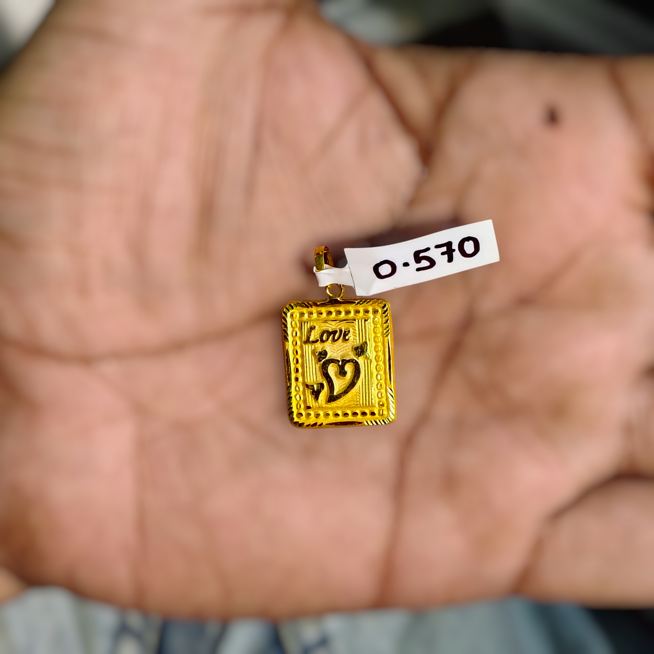 (GLKD) LOCKET WGT: 0.570 GM APPROX KDM GOLD LOCKET 1 PIECE (50 TONCH) WITH ADJUSTABLE TASSEL FOR GIFTING PURPOSE (CHAIN NOT INCLUDED).