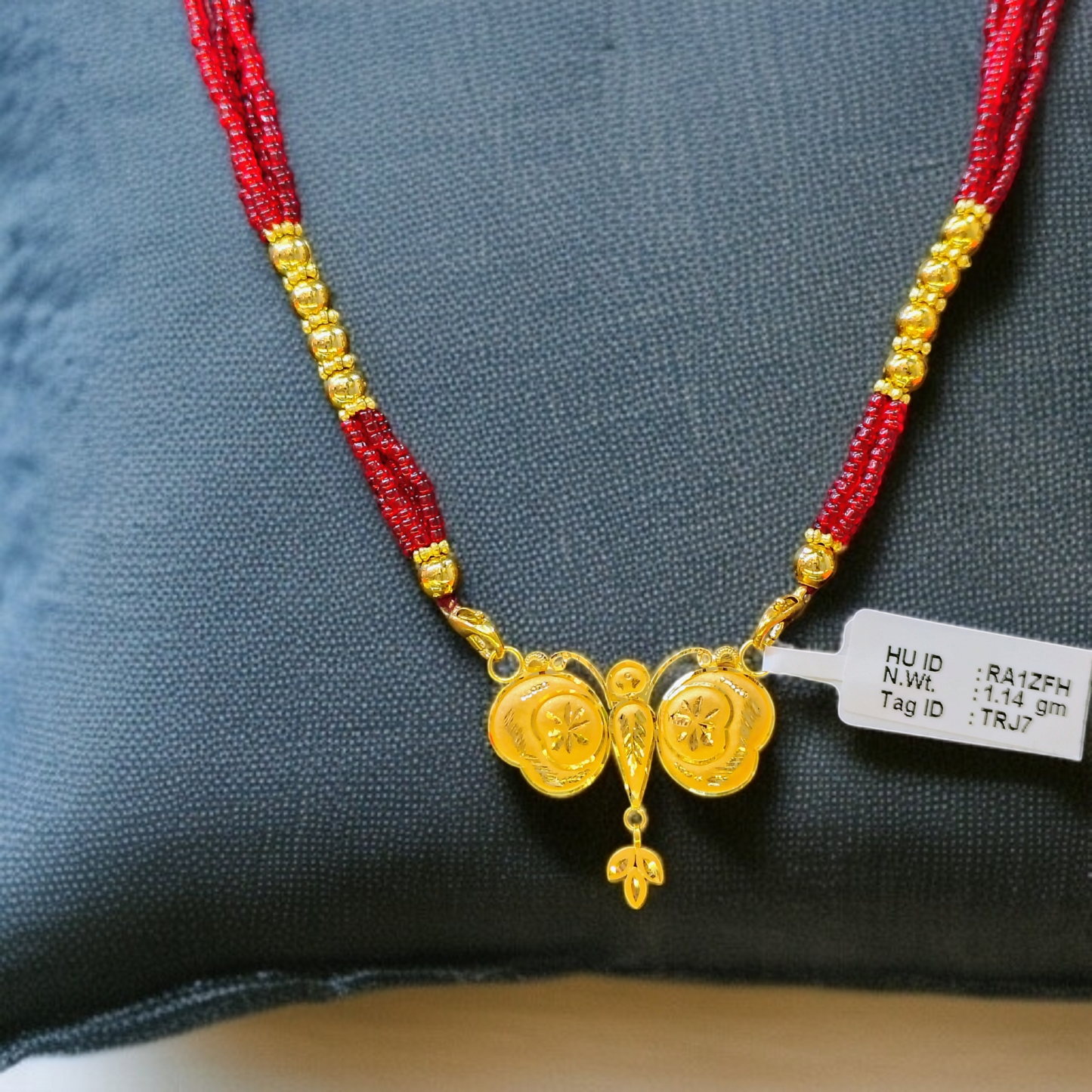 TRJ WGT: 1.140 GM APPROX 22KT HUID HALLMARK GOLD PENDANT MANGALSUTRA 1 PIECE WITH TASSEL.
