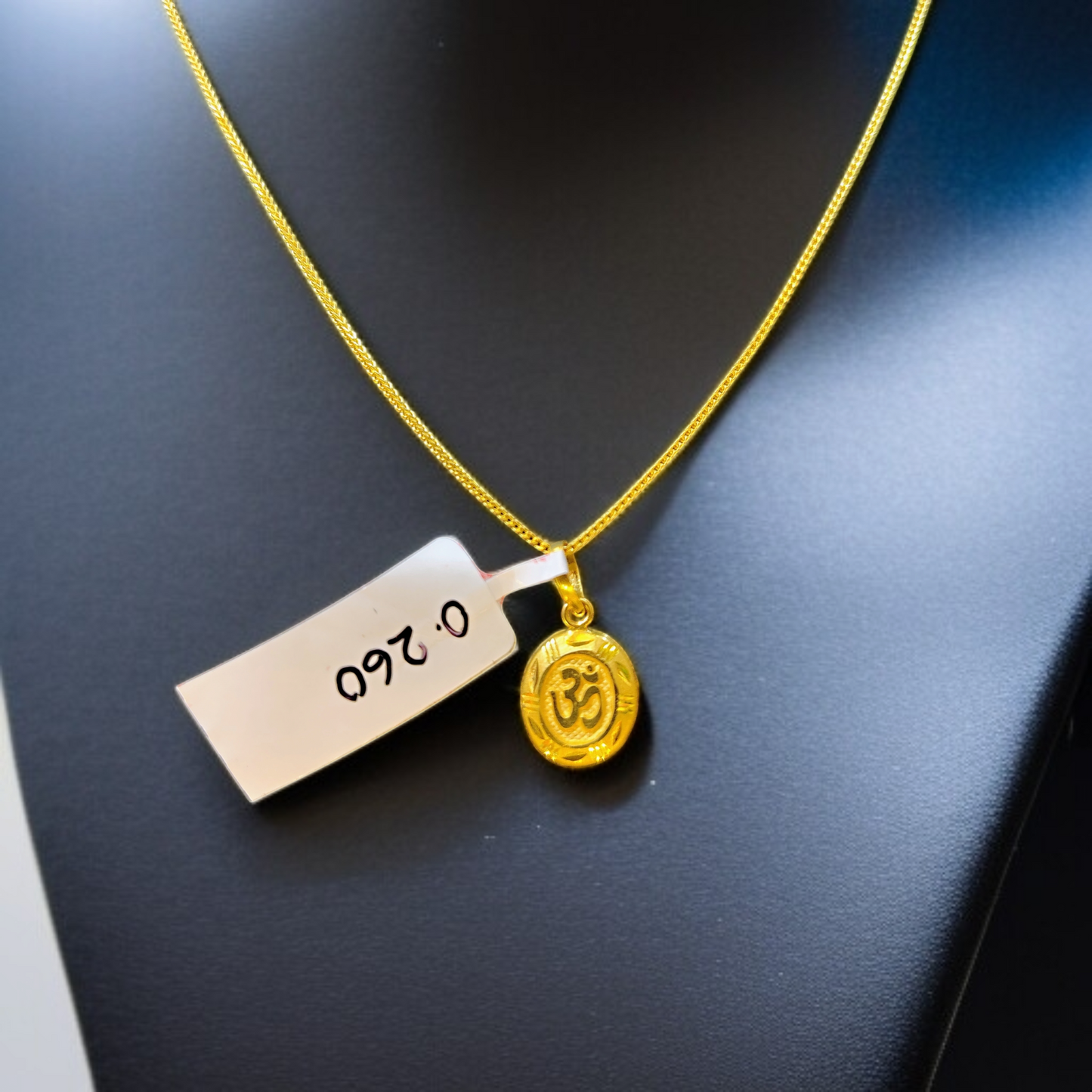 TRJ WGT: 0.260 GM APPROX KDM GOLD LOCKET 1 PIECE (50 TONCH) WITH ADJUSTABLE TASSEL.