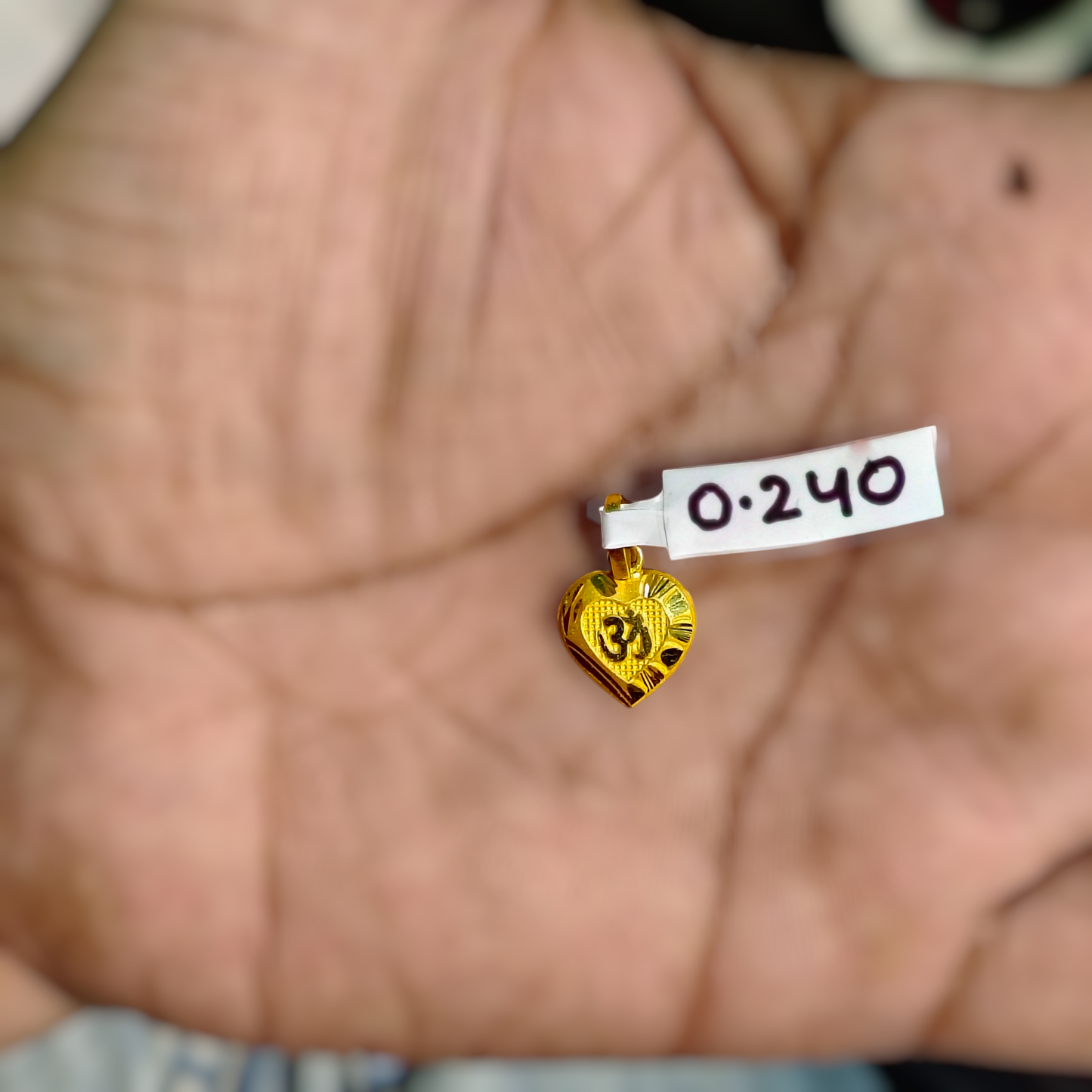 (GLKD) LOCKET WGT: 0.240 GM APPROX KDM GOLD LOCKET 1 PIECE (50 TONCH) WITH ADJUSTABLE TASSEL FOR GIFTING PURPOSE (CHAIN NOT INCLUDED).