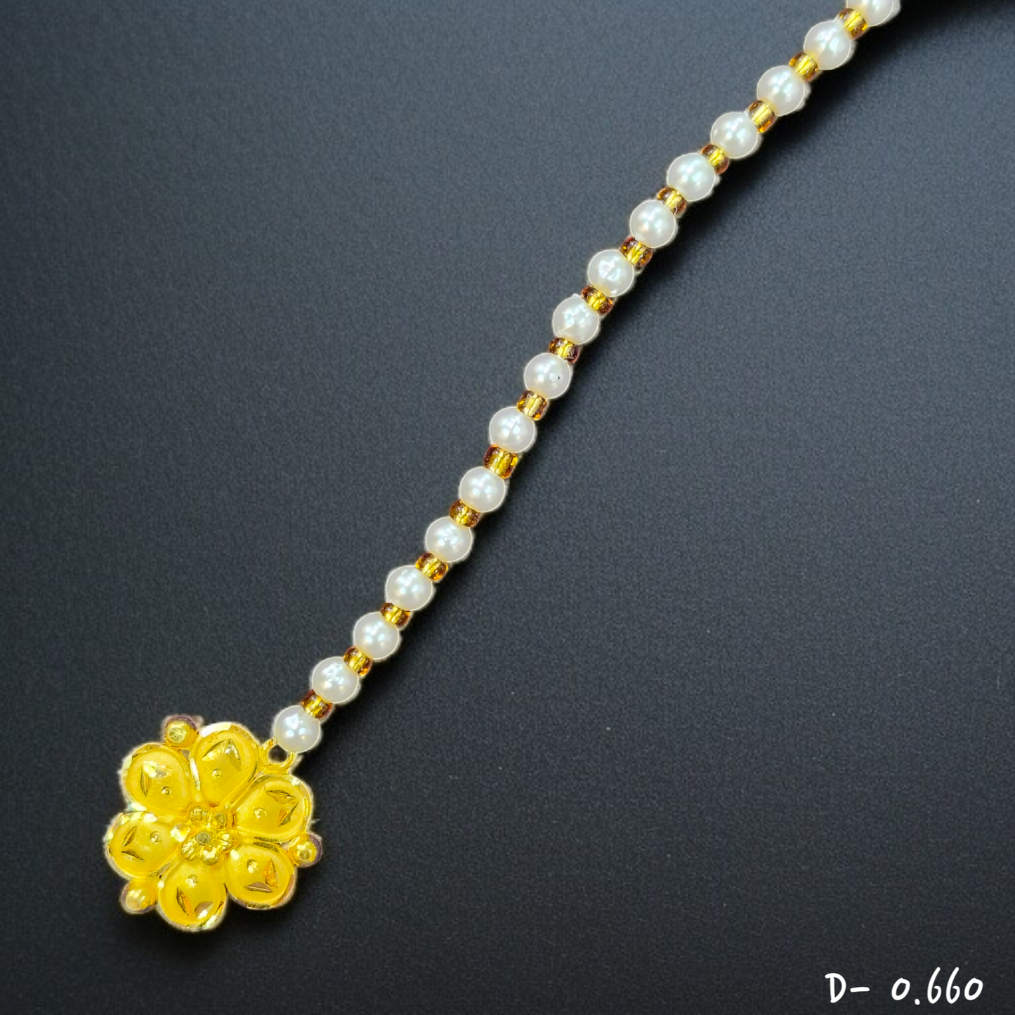 TRJ WGT: 0.660 GM APPROX 22KT HUID HALLMARK GOLD TICKLY (MANGTIKA) 1 PIECE FOR MARRIAGE.