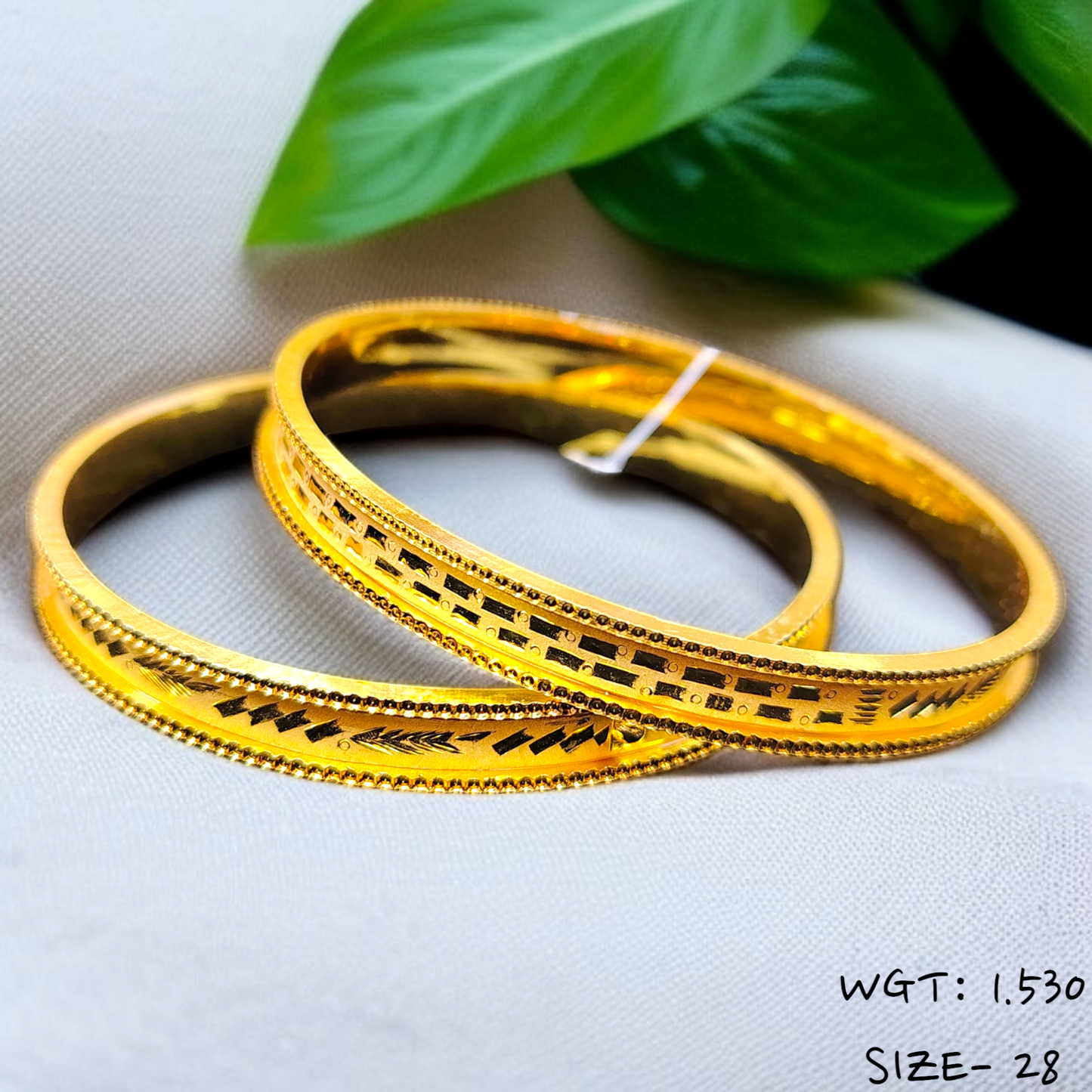 TRJ WGT: 1.530 GM APPROX (SIZE-28) 22KT HUID HALLMARK GOLD CHILA SOCKET CHURI 1 PAIR.
