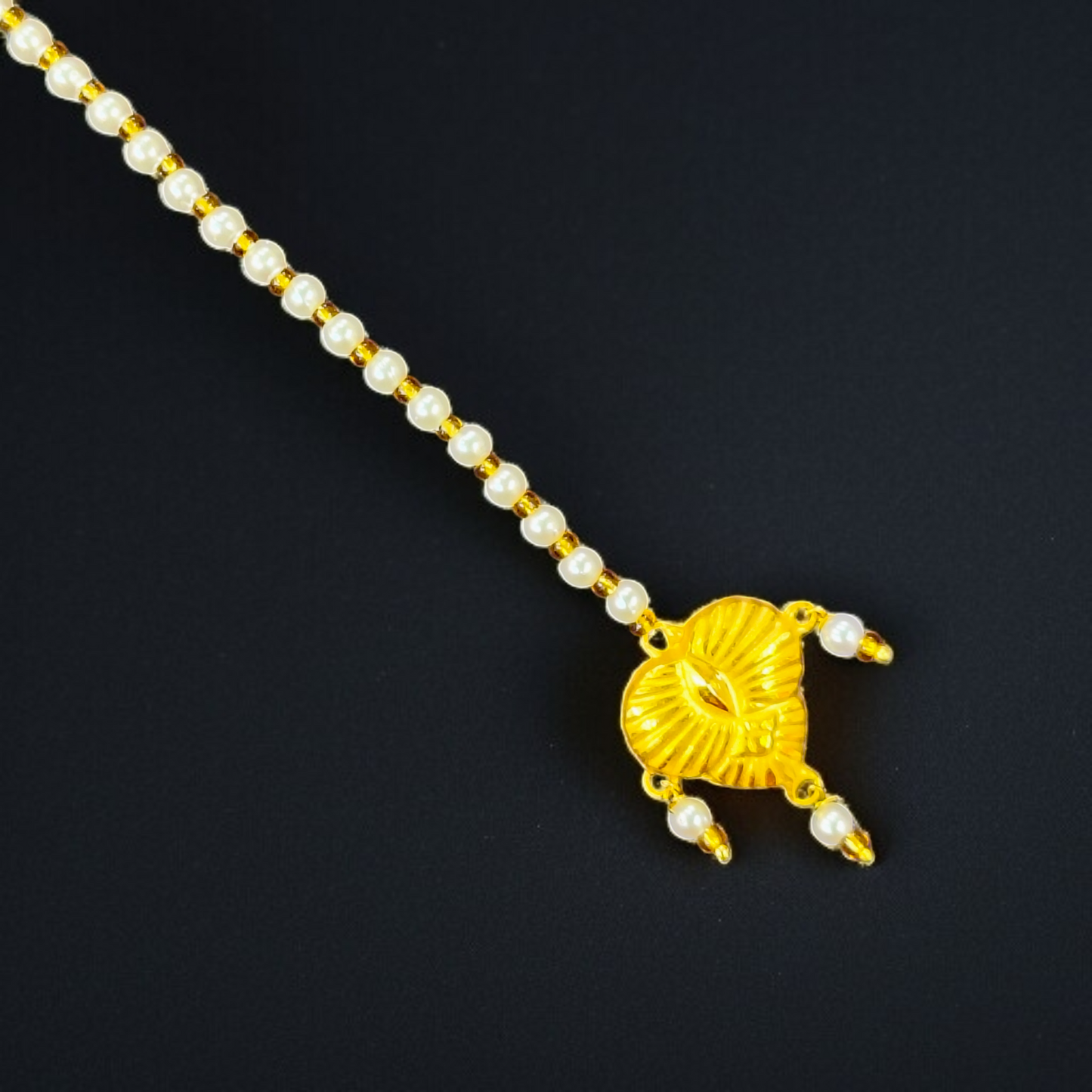 PAAN DESIGN (WGT: 0.270 GM APPROX) KDM GOLD (MANGTIKA) MOTI TICKLY 1 PIECE (50 TONCH) BEST FOR GIFT IN MARRIAGE.