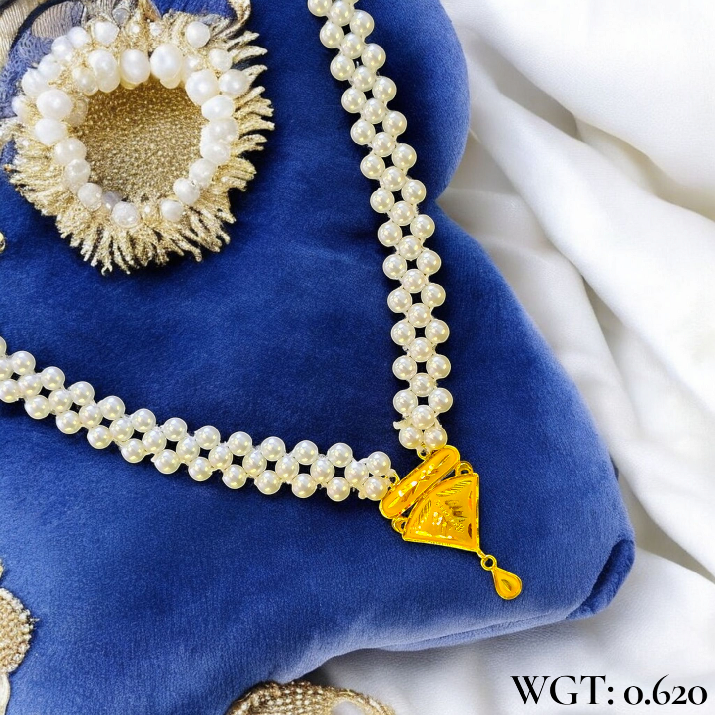 (GPM) TRJ WGT: 0.620 GM APPROX HUID HALLMARK 22KT GOLD MOTI PENDANT 1 PIECE.