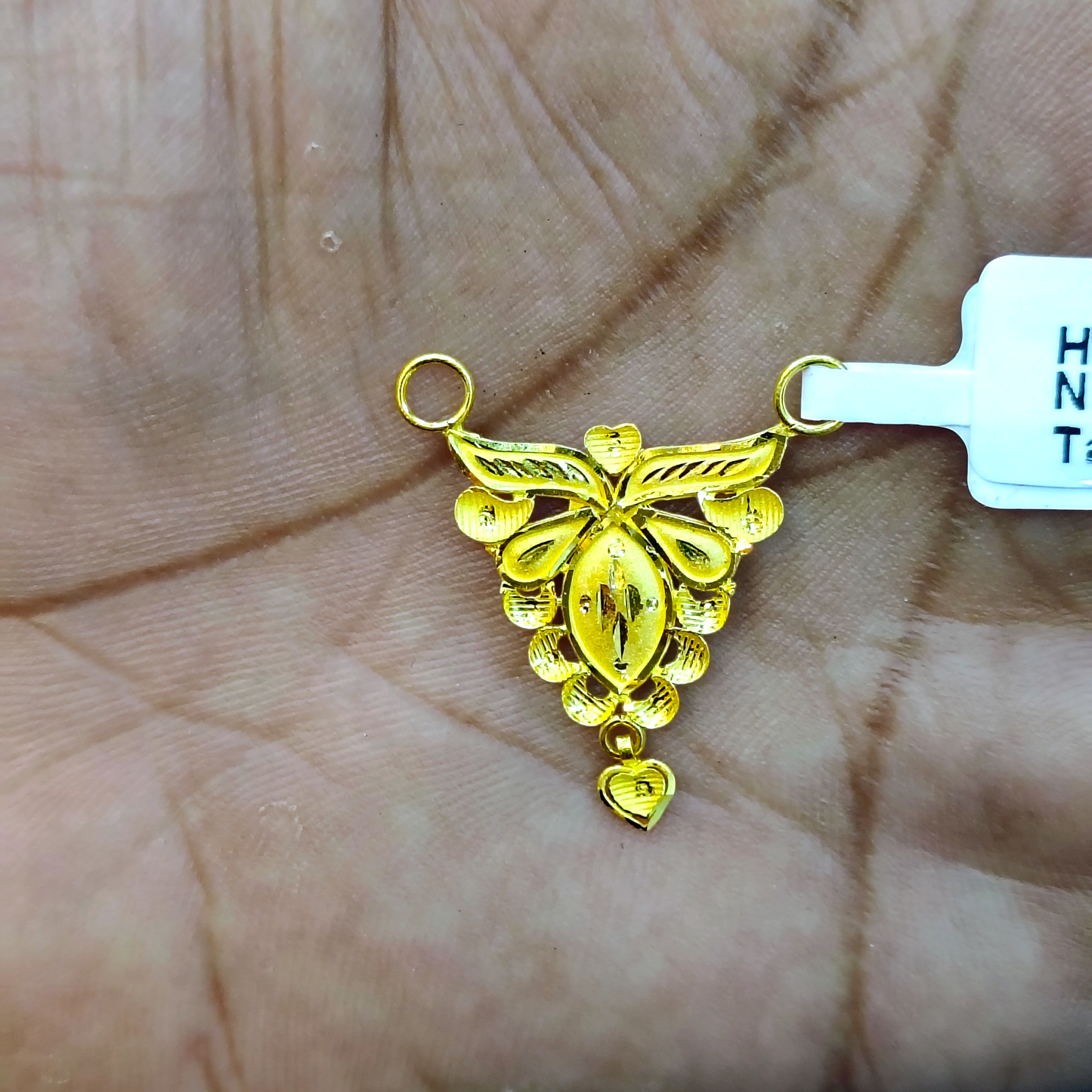 TRJ WGT: 0.820 GM APPROX 22KT HUID HALLMARK GOLD PENDANT MANGALSUTRA 1 PIECE WITH TASSEL.
