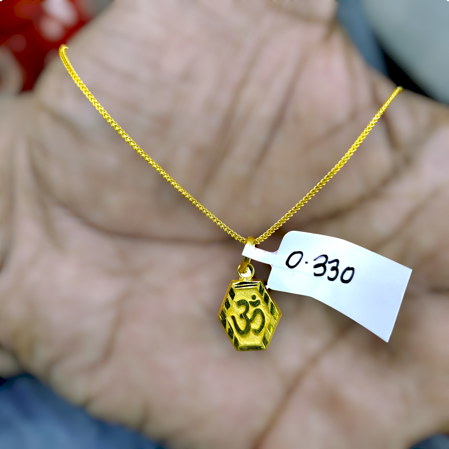 TRJ WGT: 0.330 GM APPROX KDM GOLD LOCKET 1 PIECE (50 TONCH) WITH ADJUSTABLE TASSEL.