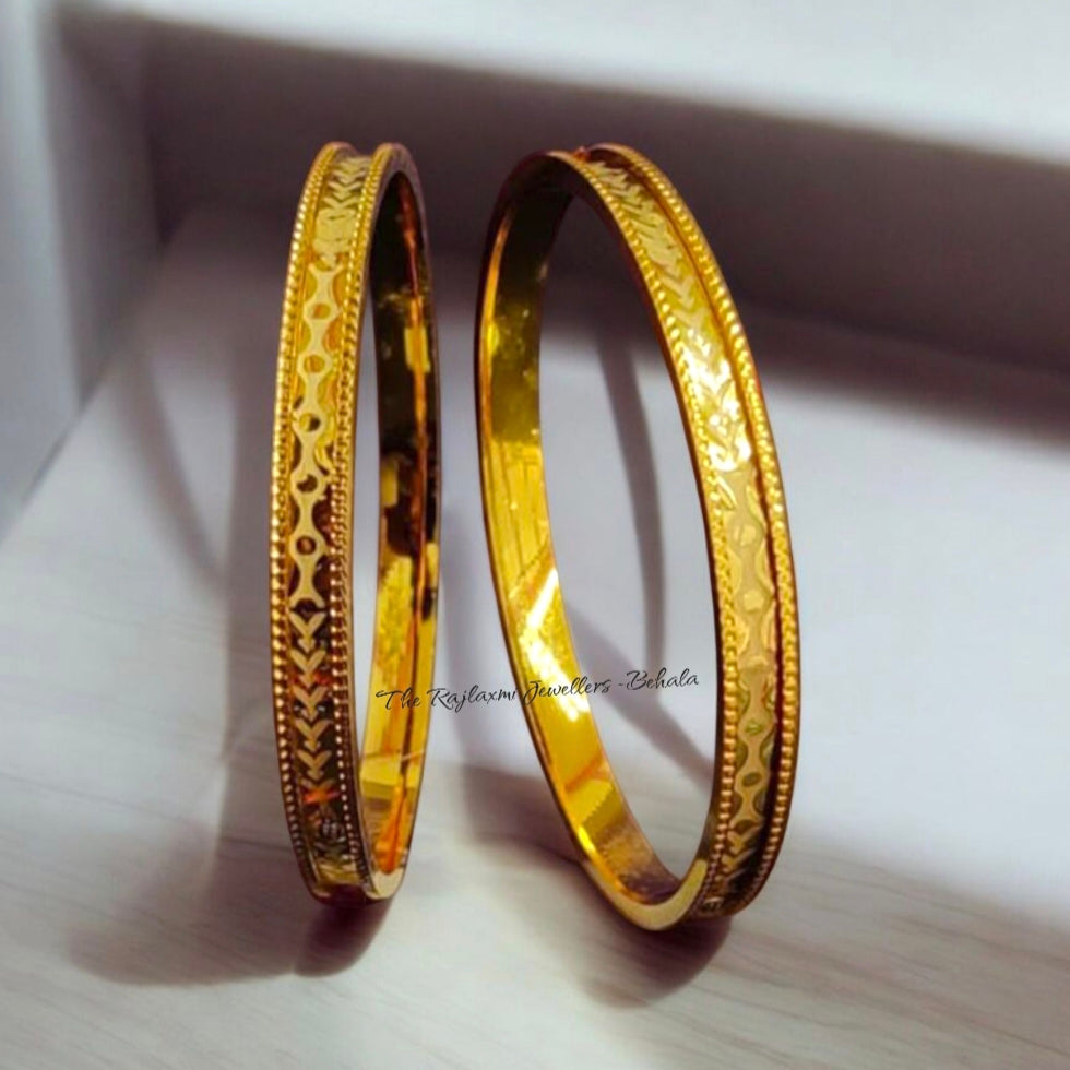 HUID HALLMARK 22KT GOLD DISCO SOCKET CHURI WGT: GM