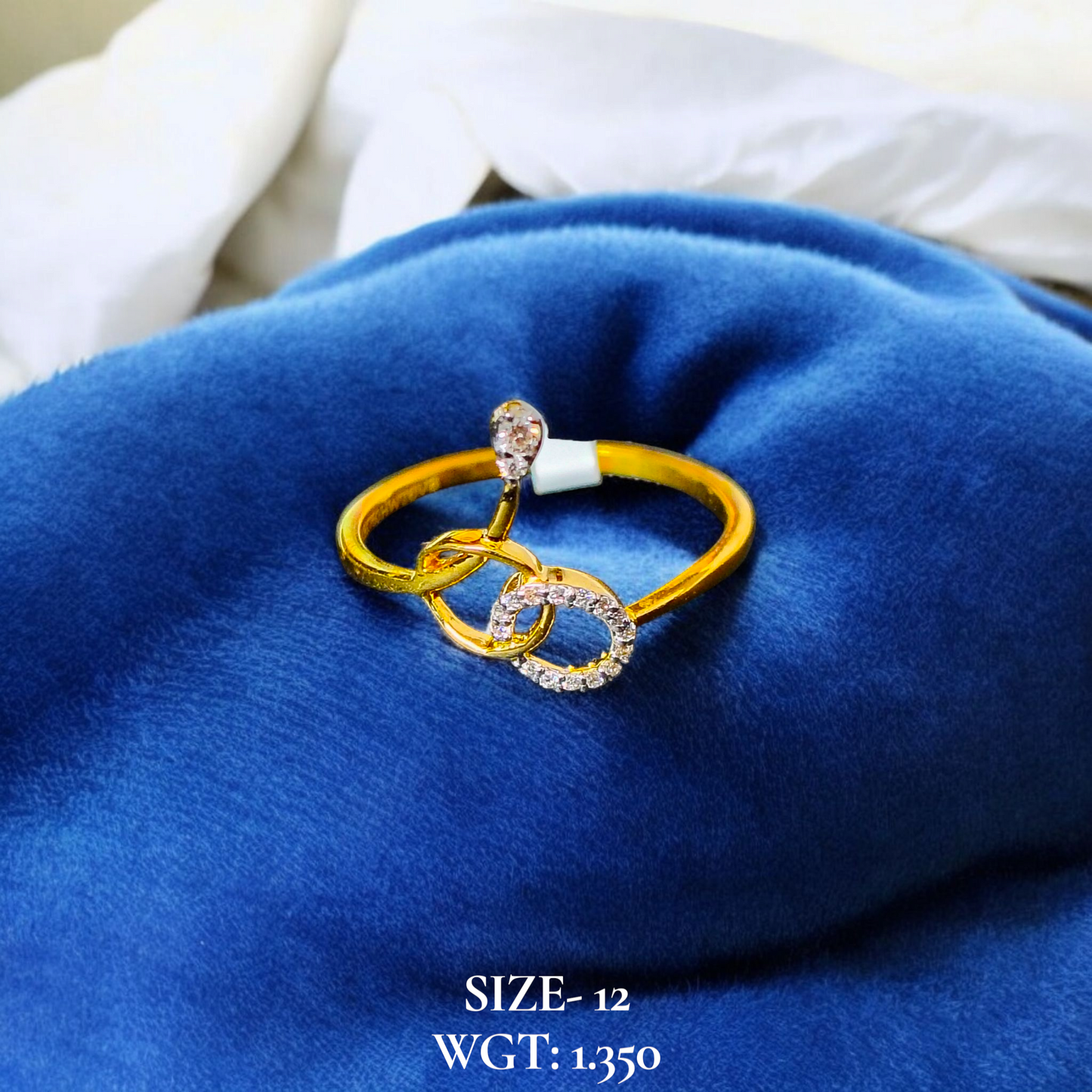 RAJLAXMI DIAMOND JEWELLERY (SIZE:12) - WGT: 1.350 GM - NATURAL DIAMOND (0.06 CENT) HUID HALLMARK 18KT DIAMOND FINGER RING FOR WOMEN WITH CERTIFICATE OF AUTHENTICITY BY ZORBA (DESIGN NO: LRAP2694).