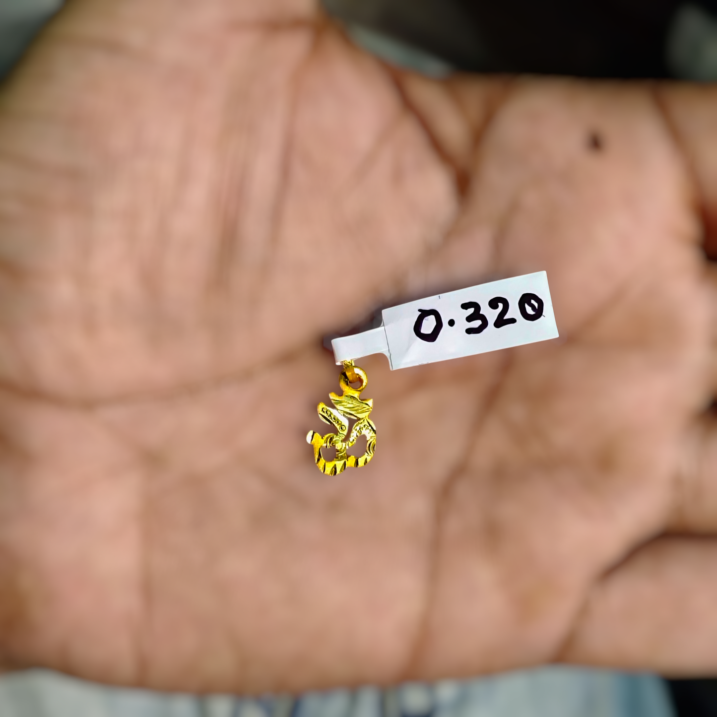 (GLKD) LOCKET WGT: 0.320 GM APPROX KDM GOLD LOCKET 1 PIECE (50 TONCH) WITH ADJUSTABLE TASSEL FOR GIFTING PURPOSE (CHAIN NOT INCLUDED).