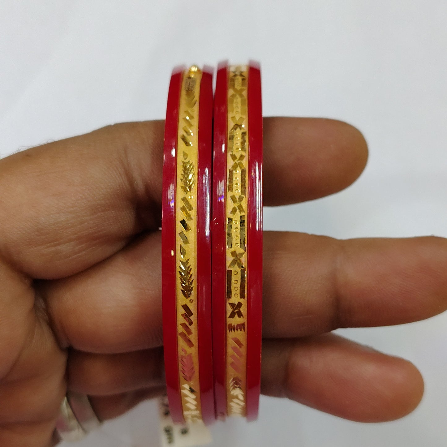 (GSP) TRJ H52YF8(SIZE: 26) WGT: 1.490 GM APPROX 22KT HUID HALLMARK GOLD POLA BANGLES 1 PAIR DESIGN FOR REGULAR USE.