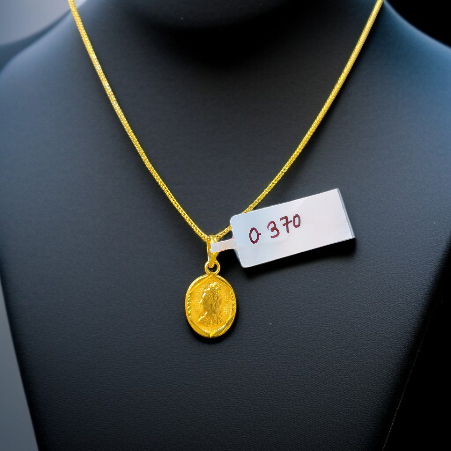 TRJ WGT: 0.370 GM APPROX KDM GOLD LOCKET 1 PIECE (50 TONCH) WITH ADJUSTABLE TASSEL.