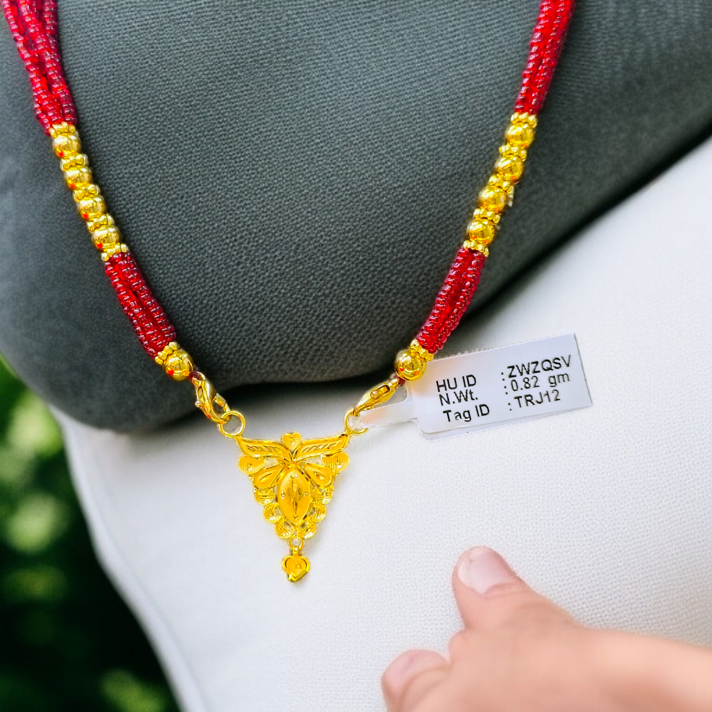 TRJ WGT: 0.820 GM APPROX 22KT HUID HALLMARK GOLD PENDANT MANGALSUTRA 1 PIECE WITH TASSEL.