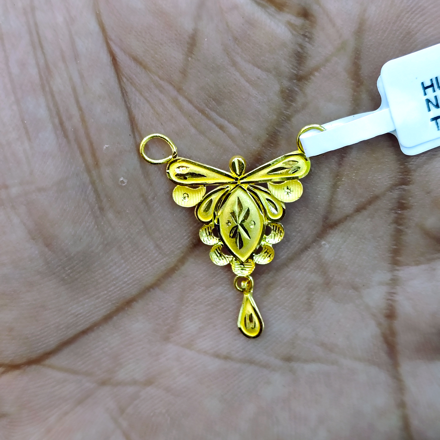 TRJ WGT: 0.790 GM APPROX 22KT HUID HALLMARK GOLD PENDANT MANGALSUTRA 1 PIECE WITH TASSEL.