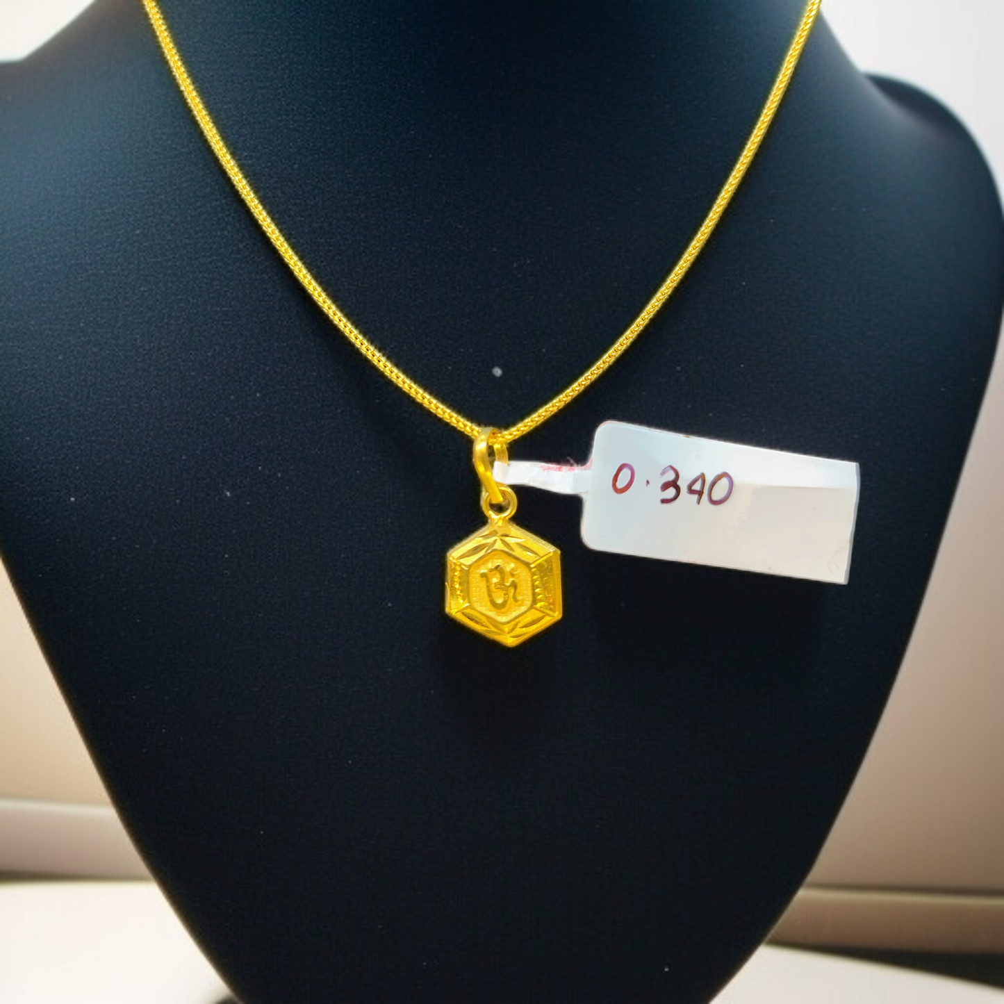 TRJ WGT: 0.340 GM APPROX KDM GOLD LOCKET 1 PIECE (50 TONCH) WITH ADJUSTABLE TASSEL.