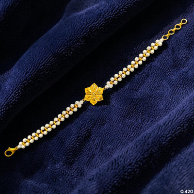 GOLD MOTI WRISTLET- (SYBGLE) (WGT: 0.420 GM APPROX) BIS CERTIFIED HUID HALLMARK 375 9KT GOLD WRISTLET (BRACELET) WITH MOTI CHAIN FOR WOMEN (ADJUSTABLE SIZE).