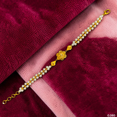 GOLD MOTI WRISTLET- (6UWJU8) (WGT: 0.380 GM APPROX) BIS CERTIFIED HUID HALLMARK 375 9KT GOLD WRISTLET (BRACELET) WITH MOTI CHAIN FOR WOMEN (ADJUSTABLE SIZE).