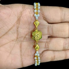 GOLD MOTI WRISTLET- (6UWJU8) (WGT: 0.380 GM APPROX) BIS CERTIFIED HUID HALLMARK 375 9KT GOLD WRISTLET (BRACELET) WITH MOTI CHAIN FOR WOMEN (ADJUSTABLE SIZE).