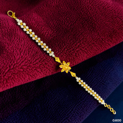 GOLD MOTI WRISTLET- (H4PEK6) (WGT: 0.600 GM APPROX) BIS CERTIFIED HUID HALLMARK 375 9KT GOLD WRISTLET (BRACELET) WITH MOTI CHAIN FOR WOMEN (ADJUSTABLE SIZE).