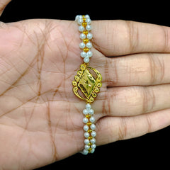 GOLD MOTI WRISTLET- (97TRRH) (WGT: 0.500 GM APPROX) BIS CERTIFIED HUID HALLMARK 375 9KT GOLD WRISTLET (BRACELET) WITH MOTI CHAIN FOR WOMEN (ADJUSTABLE SIZE).