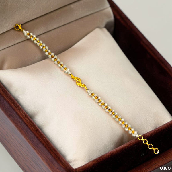 GOLD MOTI WRISTLET- (WS7XUU) (WGT: 0.180 GM APPROX) BIS CERTIFIED HUID HALLMARK 375 9KT GOLD WRISTLET (BRACELET) WITH MOTI CHAIN FOR WOMEN (ADJUSTABLE SIZE).