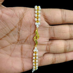 GOLD MOTI WRISTLET- (WS7XUU) (WGT: 0.180 GM APPROX) BIS CERTIFIED HUID HALLMARK 375 9KT GOLD WRISTLET (BRACELET) WITH MOTI CHAIN FOR WOMEN (ADJUSTABLE SIZE).