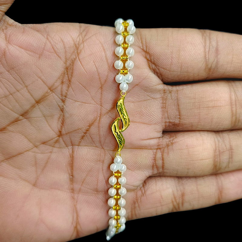 GOLD MOTI WRISTLET- (WS7XUU) (WGT: 0.180 GM APPROX) BIS CERTIFIED HUID HALLMARK 375 9KT GOLD WRISTLET (BRACELET) WITH MOTI CHAIN FOR WOMEN (ADJUSTABLE SIZE).