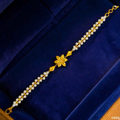 GOLD MOTI WRISTLET- (2Z8AHH) (WGT: 0.620 GM APPROX) BIS CERTIFIED HUID HALLMARK 375 9KT GOLD WRISTLET (BRACELET) WITH MOTI CHAIN FOR WOMEN (ADJUSTABLE SIZE).