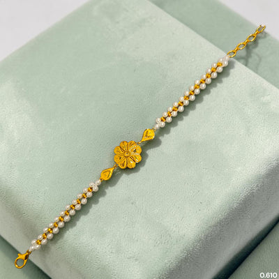 GOLD MOTI WRISTLET- (L87KVL) (WGT: 0.610 GM APPROX) BIS CERTIFIED HUID HALLMARK 375 9KT GOLD WRISTLET (BRACELET) WITH MOTI CHAIN FOR WOMEN (ADJUSTABLE SIZE).
