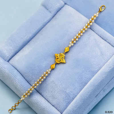 GOLD MOTI WRISTLET- (LLXT7W) (WGT: 0.520 GM APPROX) BIS CERTIFIED HUID HALLMARK 375 9KT GOLD WRISTLET (BRACELET) WITH MOTI CHAIN FOR WOMEN (ADJUSTABLE SIZE).
