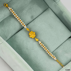 GOLD MOTI WRISTLET- (81ZASJ) (WGT: 0.580 GM APPROX) BIS CERTIFIED HUID HALLMARK 375 9KT GOLD WRISTLET (BRACELET) WITH MOTI CHAIN FOR WOMEN (ADJUSTABLE SIZE).