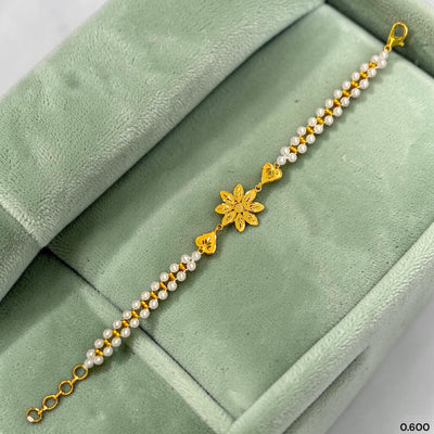 GOLD MOTI WRISTLET- (E3BCVF) (WGT: 0.600 GM APPROX) BIS CERTIFIED HUID HALLMARK 375 9KT GOLD WRISTLET (BRACELET) WITH MOTI CHAIN FOR WOMEN (ADJUSTABLE SIZE).