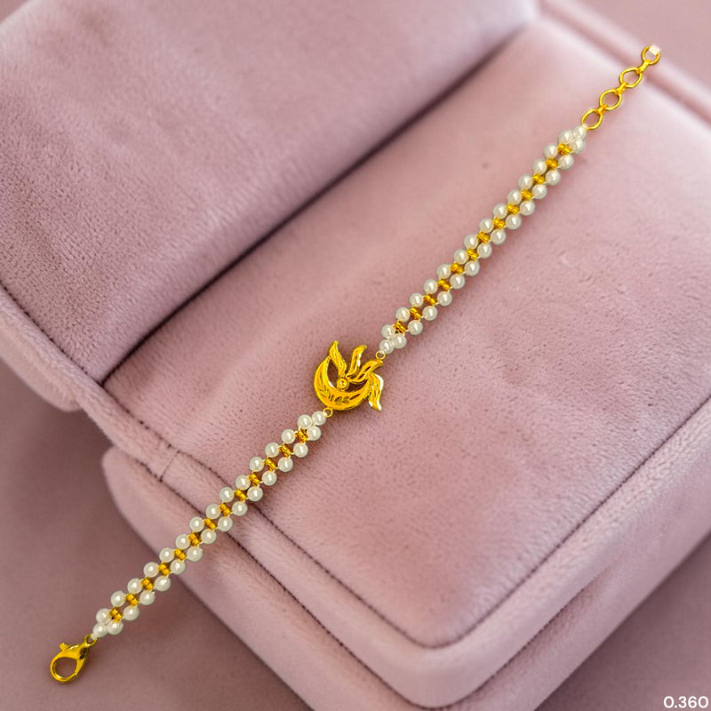 GOLD MOTI WRISTLET- (X7E6BH) (WGT: 0.360 GM APPROX) BIS CERTIFIED HUID HALLMARK 375 9KT GOLD WRISTLET (BRACELET) WITH MOTI CHAIN FOR WOMEN (ADJUSTABLE SIZE).