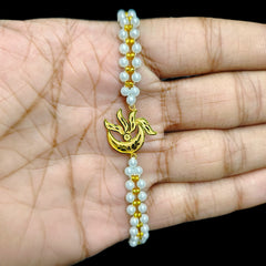 GOLD MOTI WRISTLET- (X7E6BH) (WGT: 0.360 GM APPROX) BIS CERTIFIED HUID HALLMARK 375 9KT GOLD WRISTLET (BRACELET) WITH MOTI CHAIN FOR WOMEN (ADJUSTABLE SIZE).