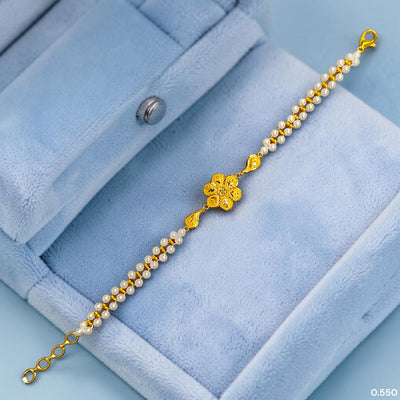 GOLD MOTI WRISTLET- (8V5JEP) (WGT: 0.550 GM APPROX) BIS CERTIFIED HUID HALLMARK 375 9KT GOLD WRISTLET (BRACELET) WITH MOTI CHAIN FOR WOMEN (ADJUSTABLE SIZE).