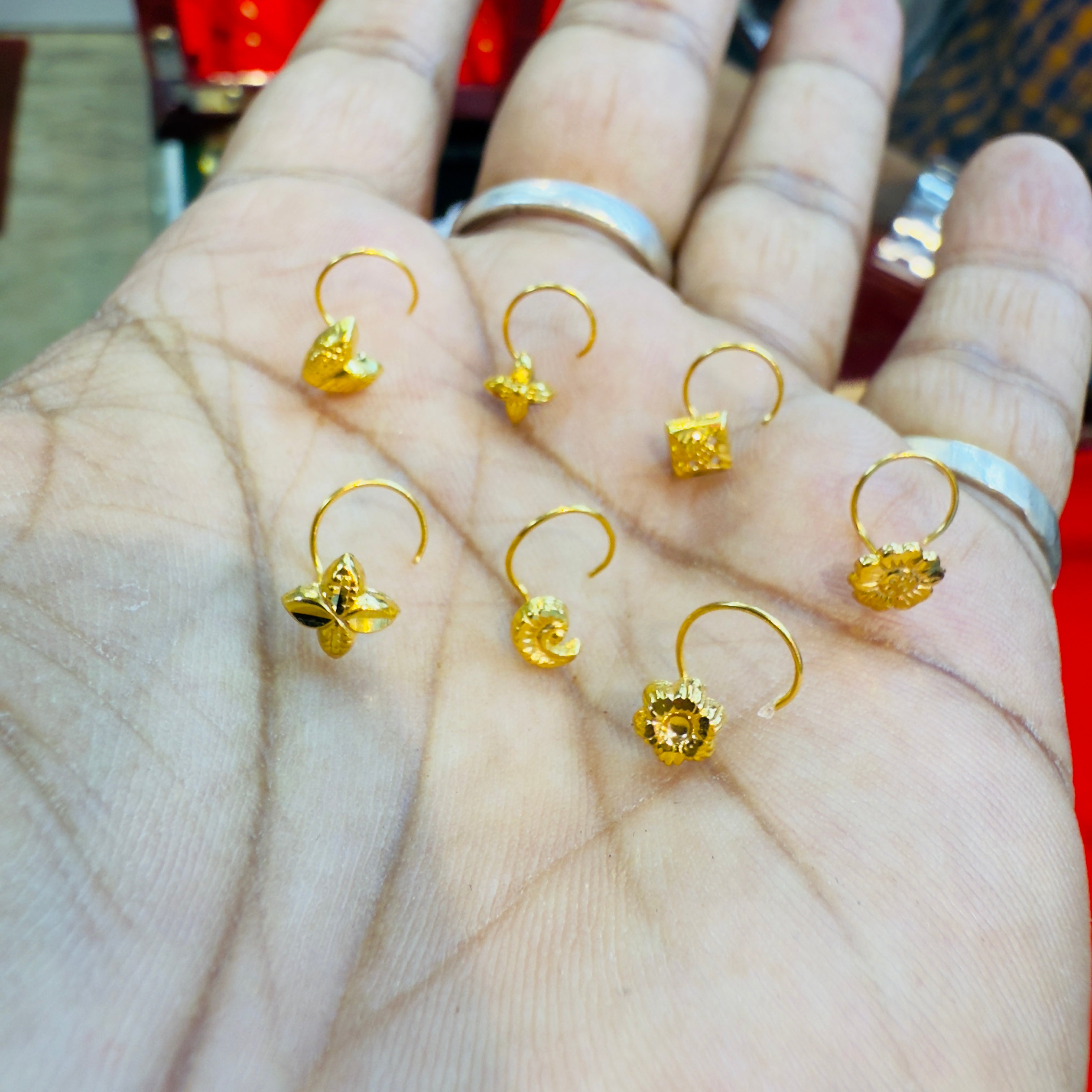 CHALLENGE ON PRICE (GNP) NOSEPIN WGT: 0.100 GM APPROX. HUID HALLMARK 9KT GOLD NOSEPIN 1 PIECE FOR GIFTING YOU LOVED ONES. (GET ANY DESIGN AS PER AVAILABLITY)- SOLD ON MRP.