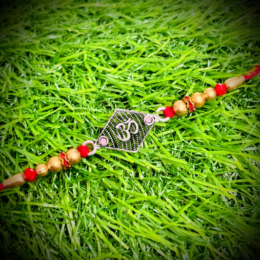 (NP) VINTAGE OXIDISED OM DESIGN 625 ORIGINAL SILVER RAKHI 1 PIECE (STRING CONNECT) WITH CHOCOLATE FOR YOUR LOVEABLE BROTHER (A PRICELESS BOND) BY RAJLAXMI.