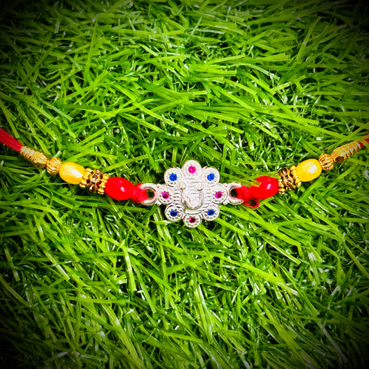 (NP) FLOWER DESIGN 625 ORIGINAL SILVER RAKHI 1 PIECE (STRING CONNECT) WITH CHOCOLATE FOR YOUR LOVEABLE BROTHER (A PRICELESS BOND) BY RAJLAXMI.