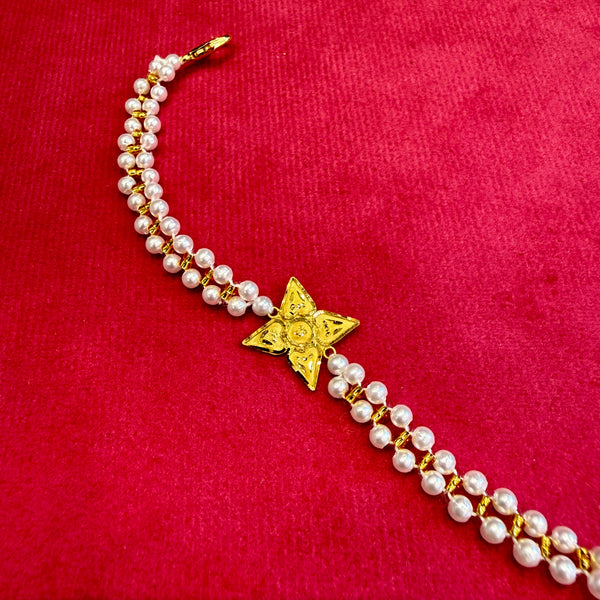 GOLD WRISTLET FOR BABY- BIS CERTIFIED HUID HALLMARK 375 9KT GOLD MOTI WRISTLET (WGT: 0.300- 0.310 GM APPROX) WITH PEARL CHAIN FOR WOMEN (ADJUSTABLE SIZE).