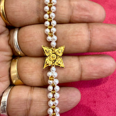 GOLD WRISTLET FOR BABY- BIS CERTIFIED HUID HALLMARK 375 9KT GOLD MOTI WRISTLET (WGT: 0.300- 0.310 GM APPROX) WITH PEARL CHAIN FOR WOMEN (ADJUSTABLE SIZE).