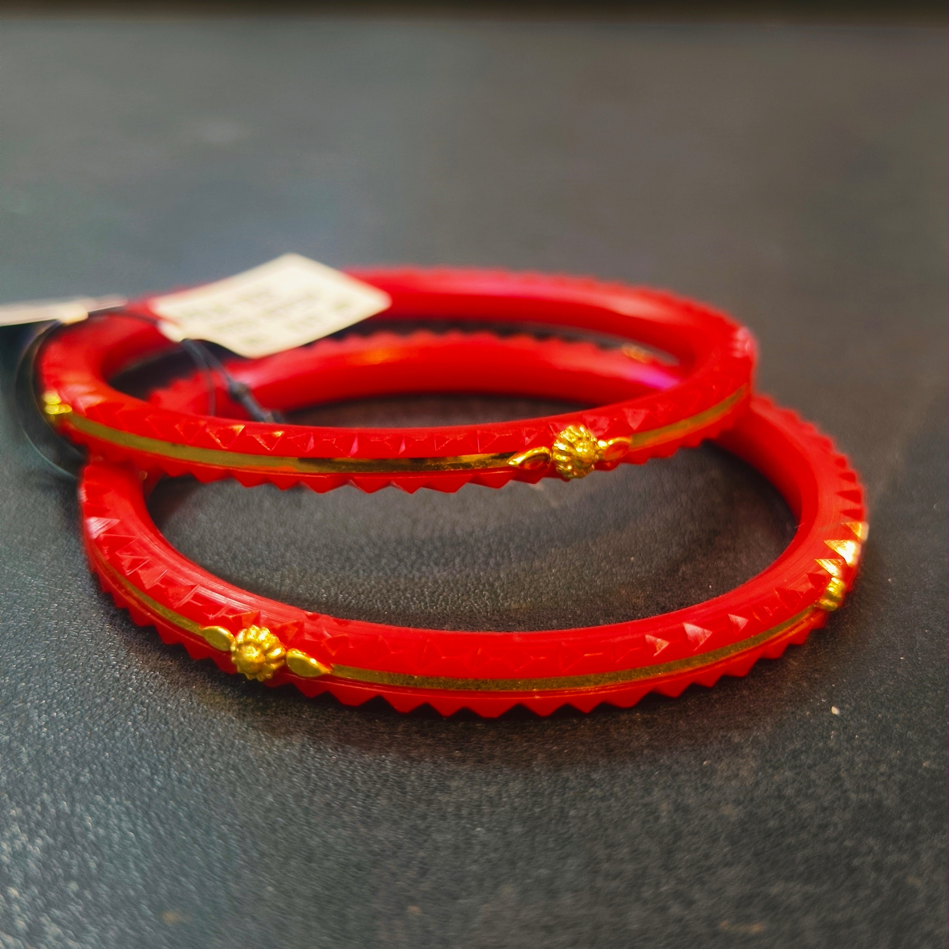 (RP) REKSI POLA HUID HALLMARK 22KT GOLD POLA BADHANO 1 PAIR FOR MARRIED WOMEN APPROX WGT 1.00 GM.