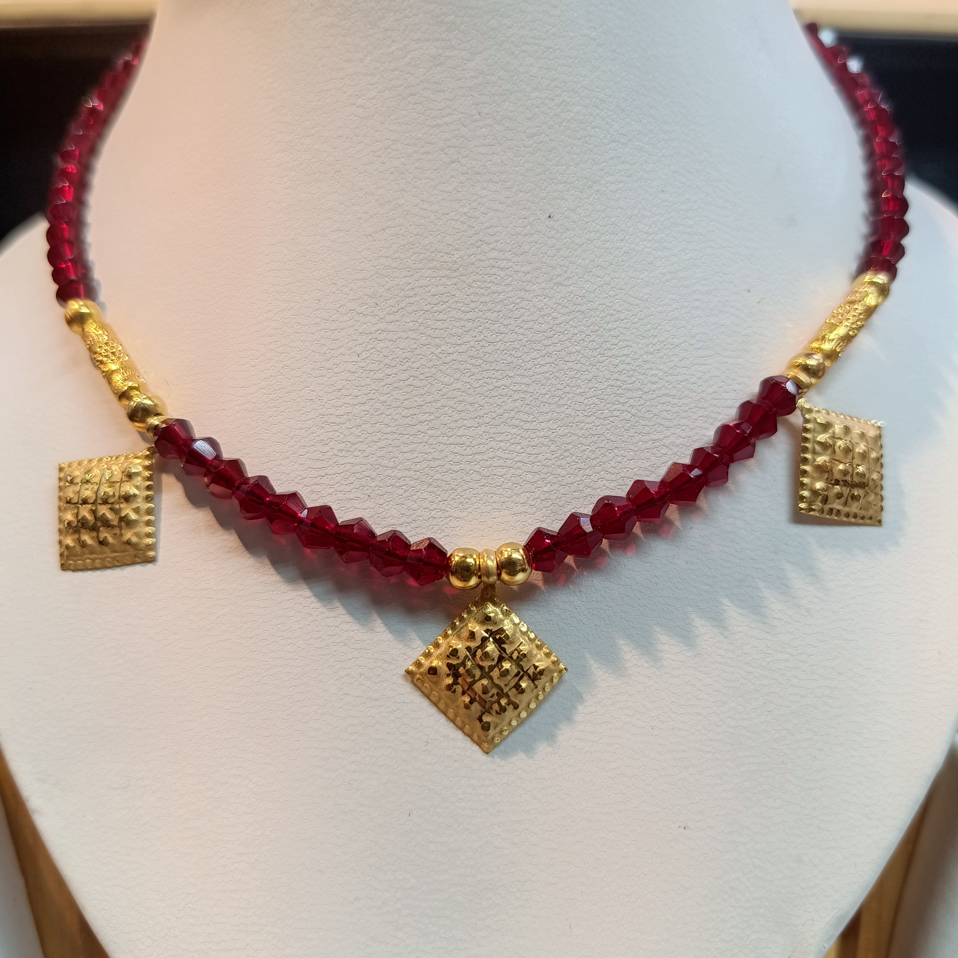 (RP) WGT: 0.600 GM APPROX KDM GOLD SELIHAR DOT BARFI DESIGN 1 PIECE WITH ADJUSTABLE TASSEL (50 TONCH) FOR GIFT PURPOSE.