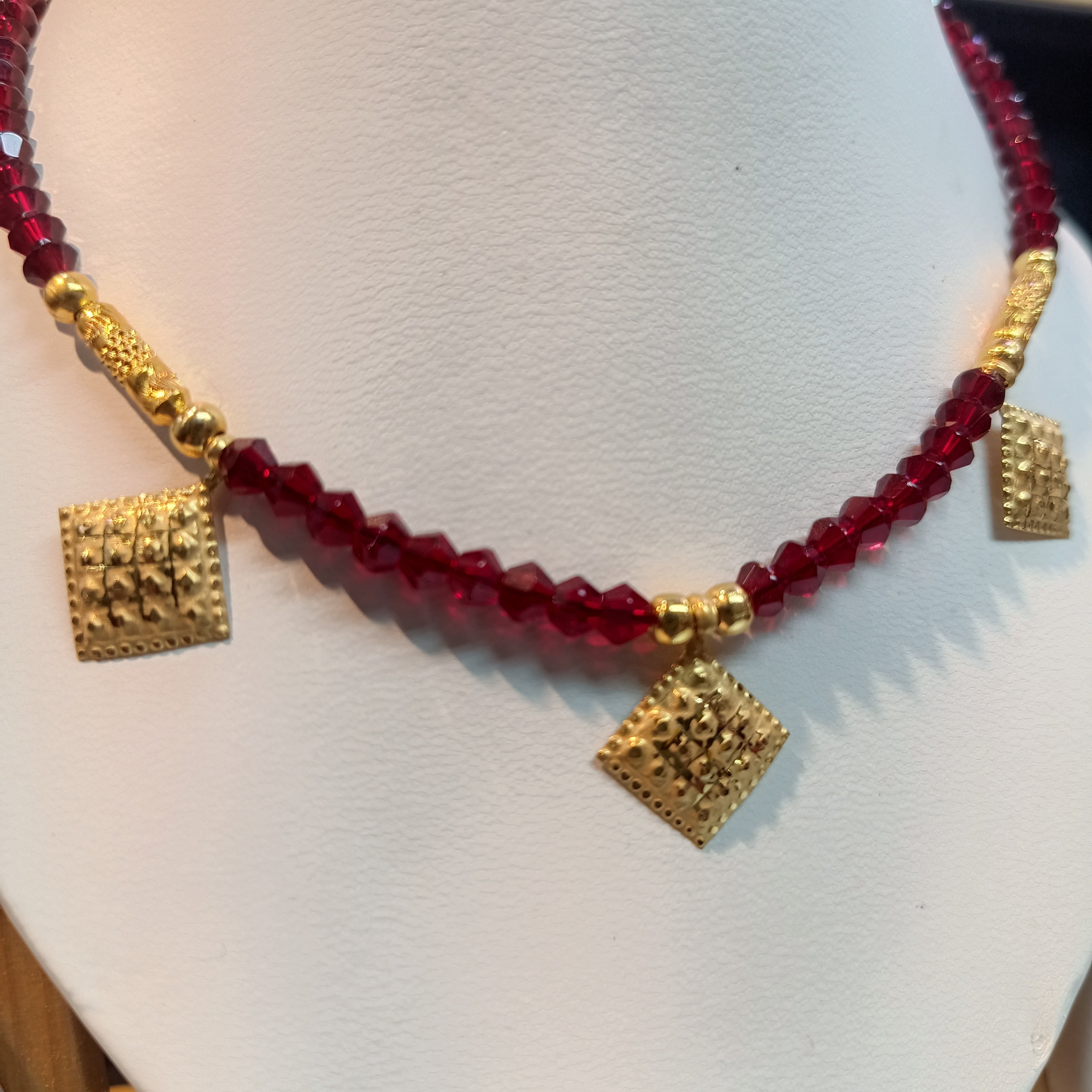 (RP) WGT: 0.600 GM APPROX KDM GOLD SELIHAR DOT BARFI DESIGN 1 PIECE WITH ADJUSTABLE TASSEL (50 TONCH) FOR GIFT PURPOSE.