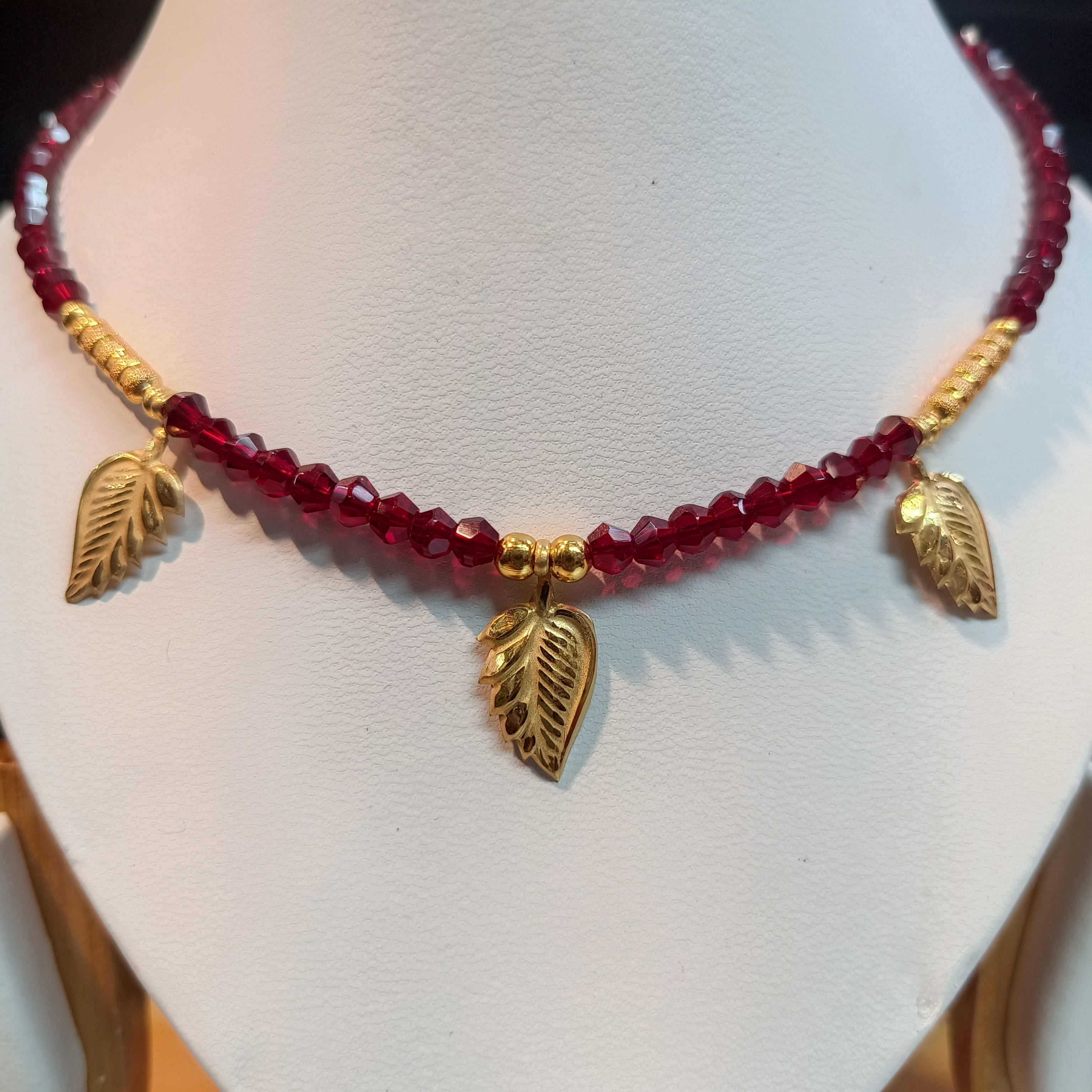 (RP) WGT: 0.550 GM APPROX KDM GOLD SELIHAR LEAF DESIGN 1 PIECE WITH ADJUSTABLE TASSEL (50 TONCH) FOR GIFT PURPOSE.