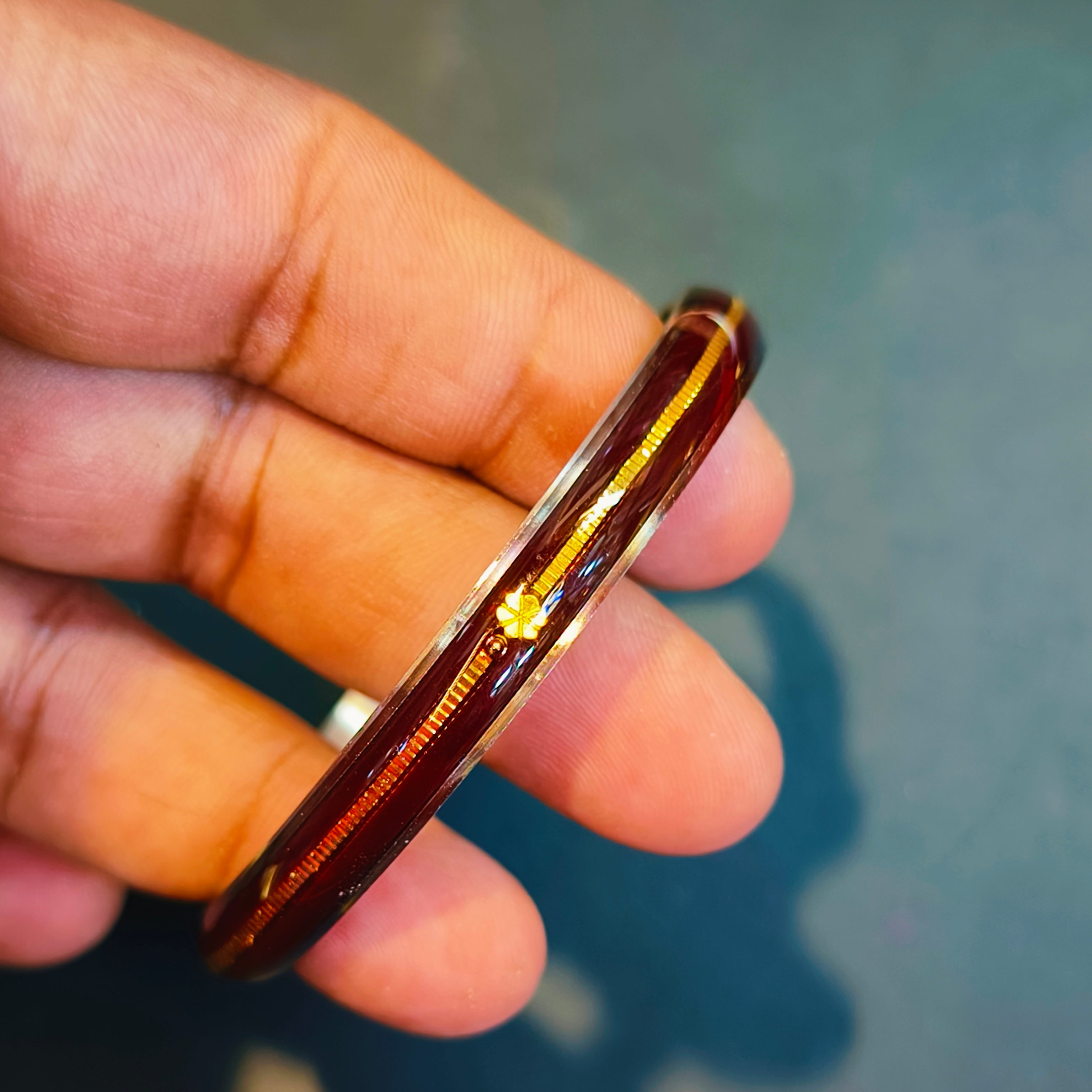 (FACEBOOK VIRAL) MAROON GLASS LAMINATED HUID HALLMARK 22KT GOLD NOA BANGLES VIRAL NOA 1 PIECE APP. WGT: 0.100 - 0.150 GM WITH PURITY CARD ( FUTURE EXCHANGE VALUE  RS 1000) WITH ANY JEWELLERY FOR LIFETIME