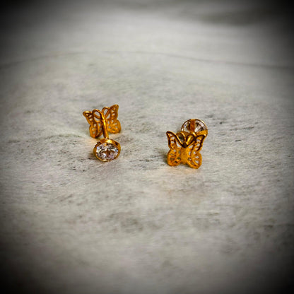 (RP-NP) APPROX GROSS WGT: 0.960 GM PAPER CASTING DESIGN HALLMARK 18KT GOLD STUD TOPS CZ 1 PAIR (DUAL SIDE WEAR) REGULAR WEAR BY RAJLAXMI.