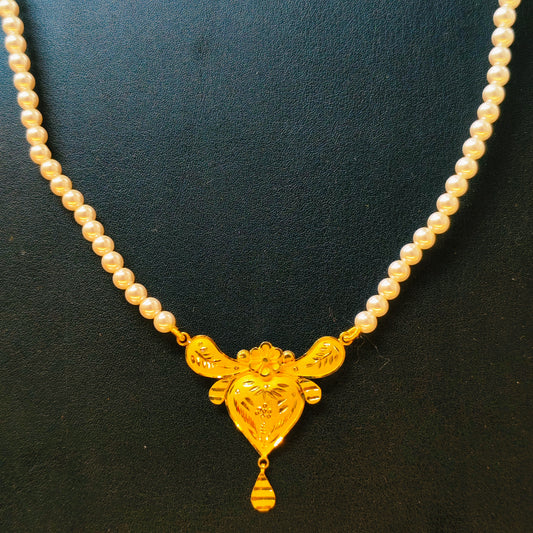 TRJ (RP) NP APPROX WGT: 1.350 GM HUID HALLMARK 22KT GOLD PENDANT (1 PIECE) WITH PEARL TASSEL BY RAJLAXMI.